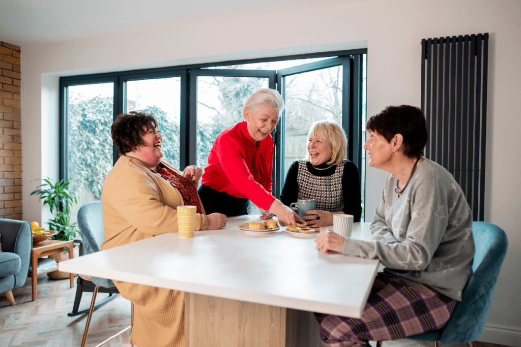 A Group of Women Supporting Each Other Over Morning Tea