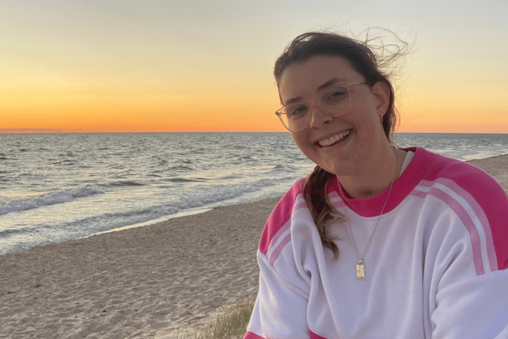 Faith smiling at the beach