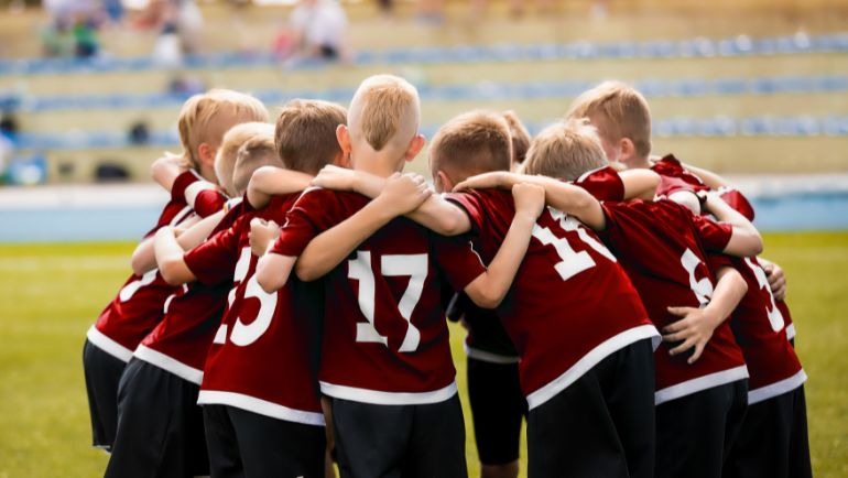 Sport Kids in a Huddle for Concussions in children article